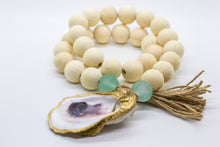 Load image into Gallery viewer, The Gilded Shell - Hospitality Beads - Wooden Beads - Nude Beach Coastline - Aqua Marine Sea Glass - 18k Gold Gilded Oyster Shell
