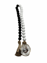 Load image into Gallery viewer, boho white and black beads coastline with gilded oyster shell. product shot